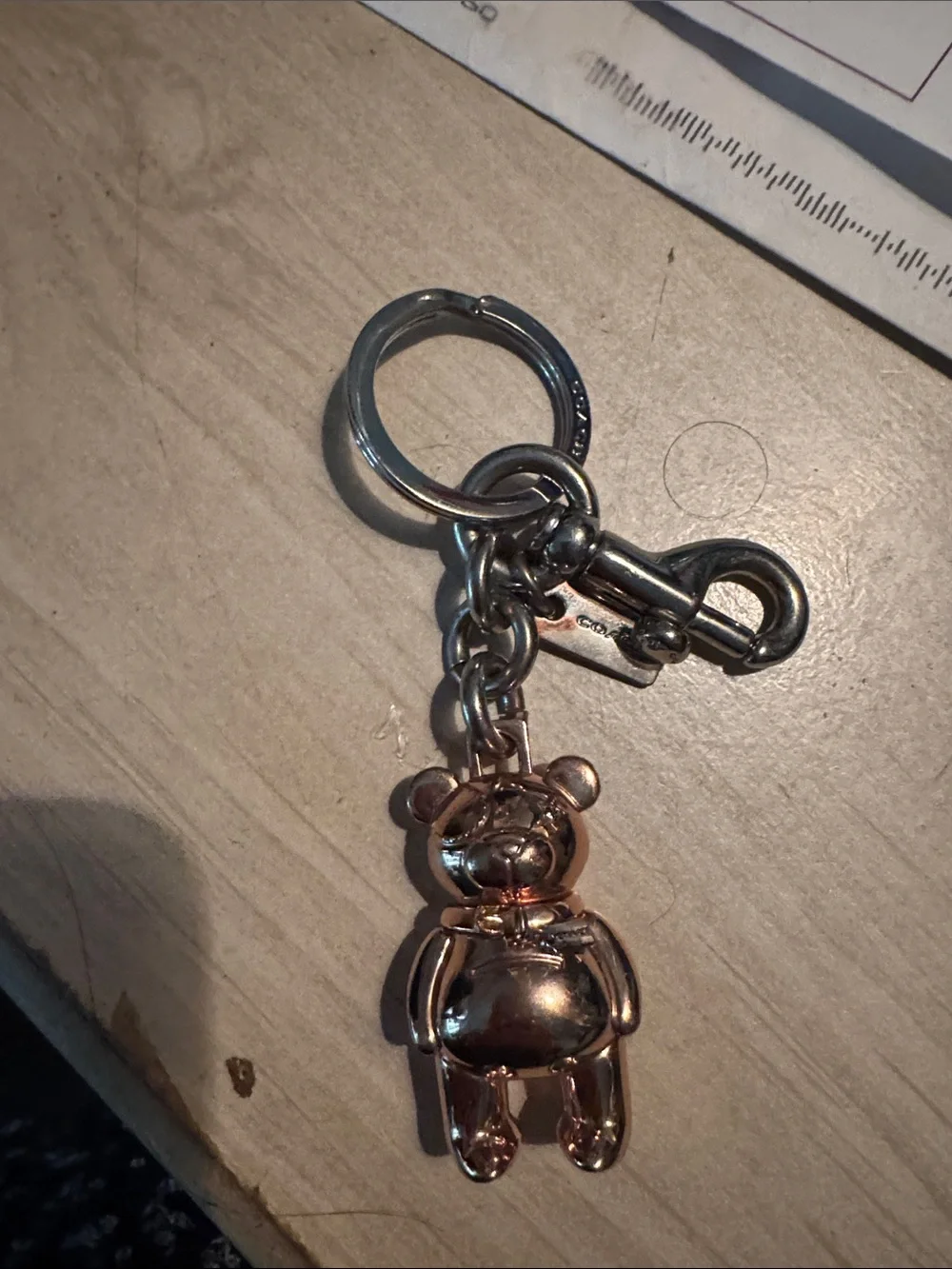 Coach Rose Gold Teddy Bear Keychain Charm